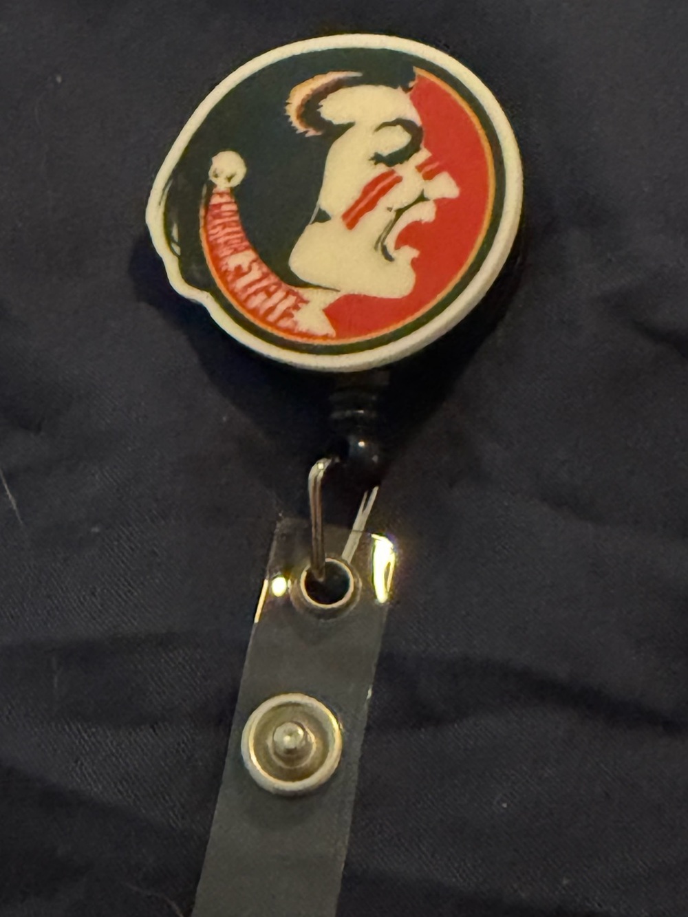 Retractable Badge Reel with Garnet and Gold Seminole-Inspired Shield